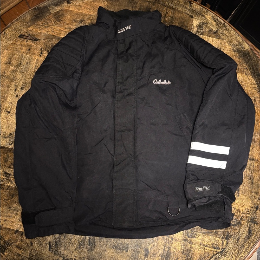 Cabela's black motorcycle jacket. Gortex shell, reinforced shoulder, reflective